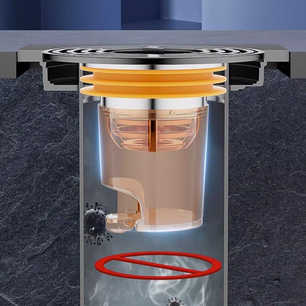 un siphon de sol anti-odeurs / grille de drainage inox avec filtre