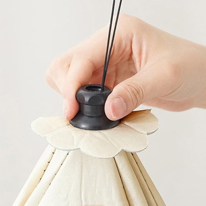 Un couvercle isolant pliable pour garder les plats chauds